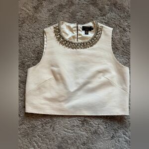 White Sleeveless Top with Embellished Neckline